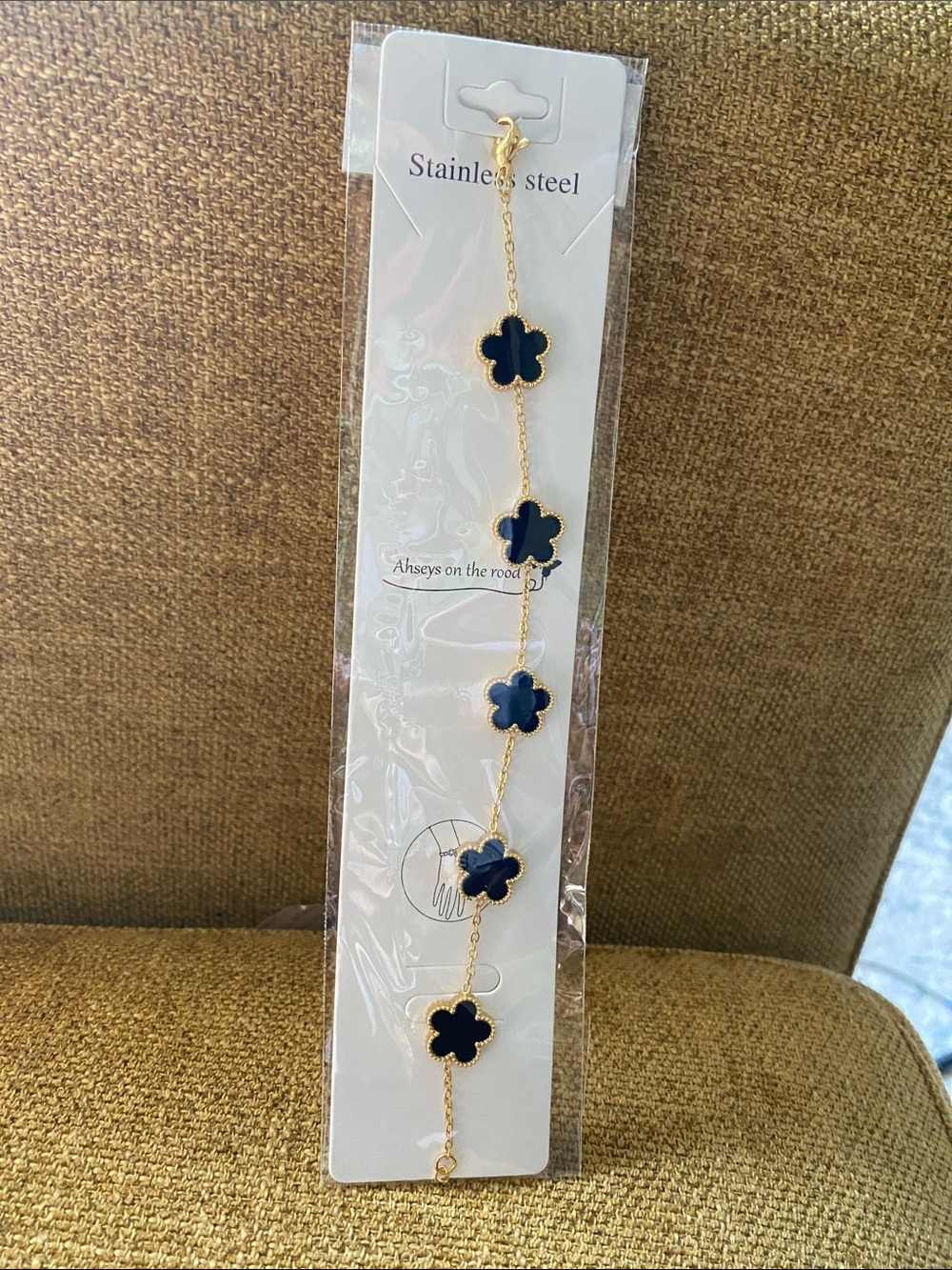 Stainless Steel Gold Bracelet with Navy Clover Charms